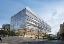 Architectural rendering of the University of Louisville Health & Science Center, a glass building with curved white floor bands, seen from the street corner
